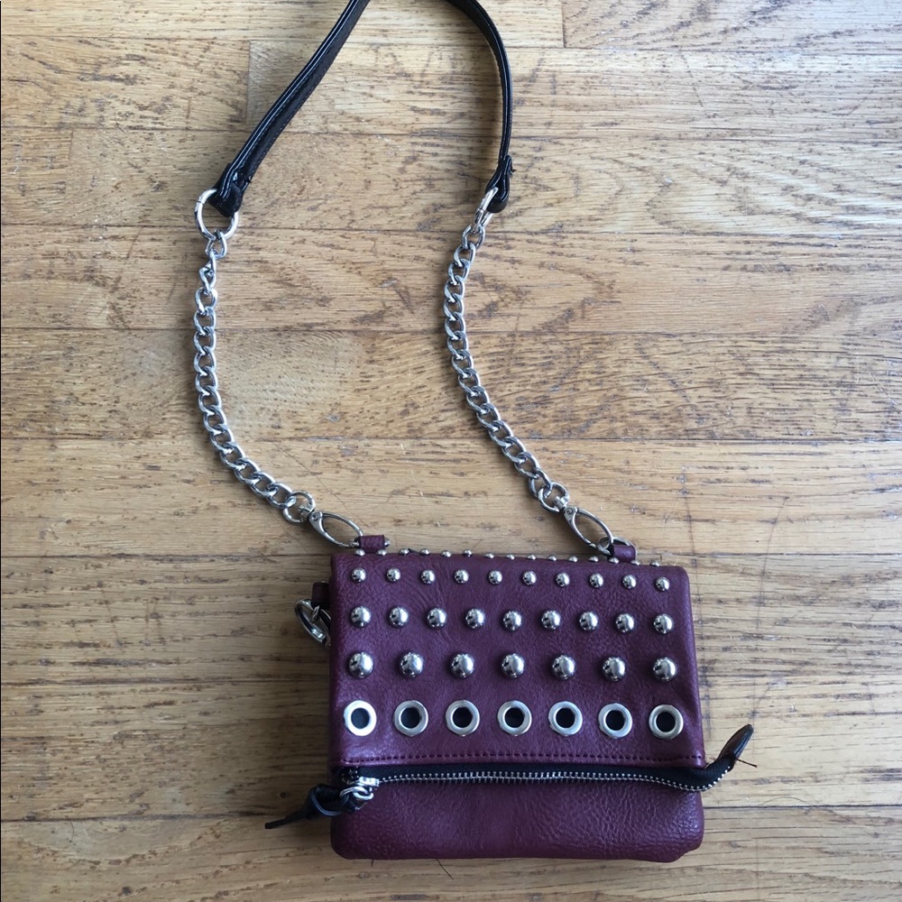 Maroon Madden Girl clutch with shoulder straps
